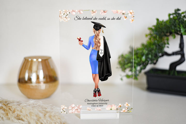 If you&#39;re searching for a one-of-a-kind and personalized graduation present, our custom plaque featuring more than 100 dresses and 250 hairstyles is your answer! This stunning and intricate print is the perfect way to honor your loved one&#39;s.