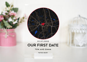 a glass plaque with a picture of a city on it